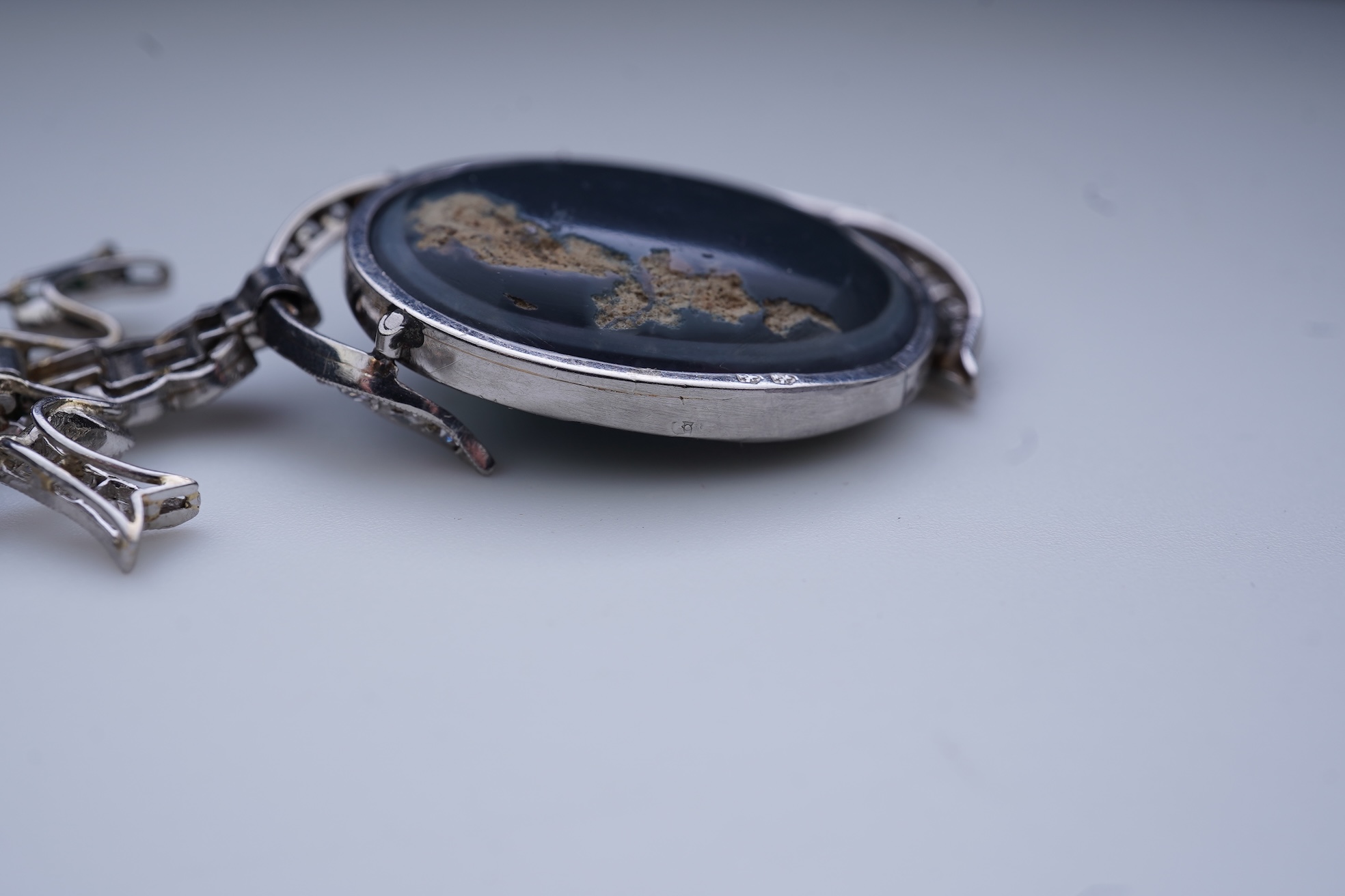 An impressive Belle Epoque black opal and diamond pendant, early 20th century
